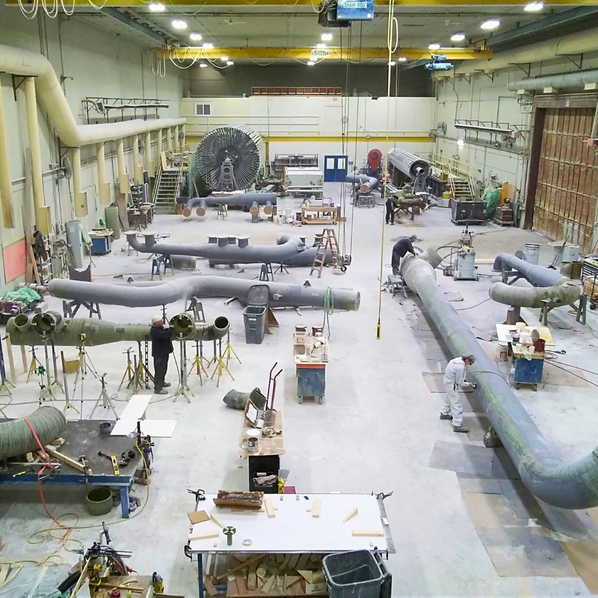 Troy Dualam Inc. working on an Industrial Pipe project. Learn how to choose the right material for Industrial Pipes.